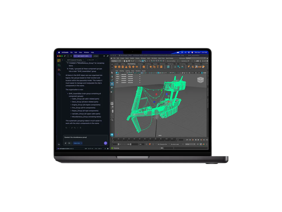MacBook Pro noir sidéral ouvert, vu de face ; l'écran montre l'application LM Studio à côté d'une maquette 3D verte dans Autodesk Maya.