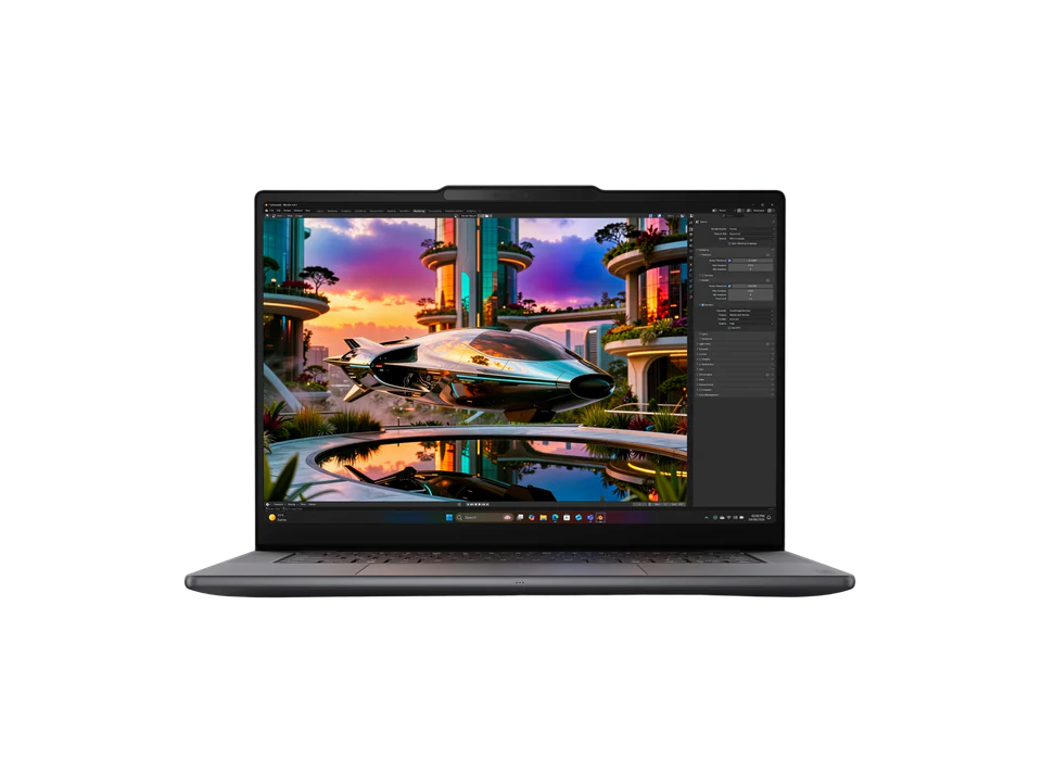 PC portable Lenovo Yoga Pro 9n gris ouvert, vu de face ; l'écran montre un logiciel de retouche avec une ville futuriste et un vaisseau argenté.